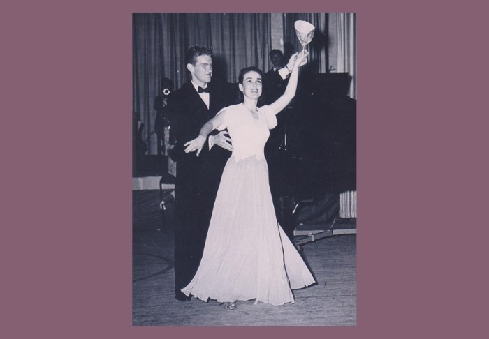slide-5 Vintage photo of a formally dressed couple ballroom dancing with a trophy